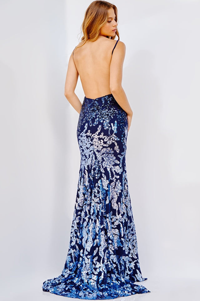 Jovani 0974 Sequin Embellished Sexy Backless Thigh High Slit Prom Dress.  Unleash your inner glam goddess with the Jovani 09749 Navy Light Blue Embellished Backless Prom Dress! This showstopping piece features a sequin-covered bodice, a form-fitting silhouette, and a floor-length skirt with a daring thigh-high slit and subtle train.