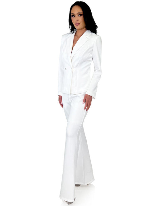 The Marc Defang 8124 Scuba Pageant Jumpsuit is a formal and professional pant suit with crystal blazer buttons. This jumpsuit is made of high-quality and durable Scuba fabric that ensures a comfortable fit for a wide range of body types. The Crystal blazer buttons add a unique touch of style to the look.  Sizes: 00-16  Colors: Baby Blue, White, Hot Pink, Neon Green, Royal, Seafoam, Black  *Ask for custom color - Allow 30 days Production