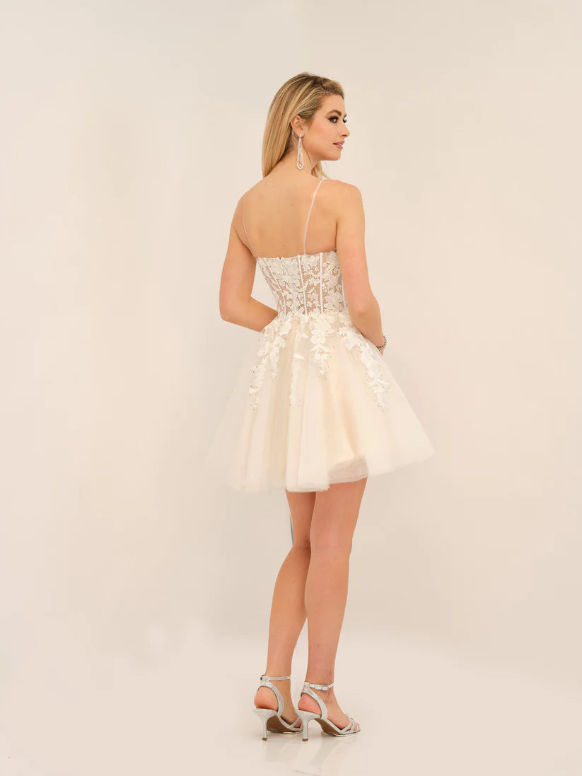Dave & Johnny 11206 is the perfect homecoming dress. Crafted from sheer lace, it features an elegant illusion neckline and sparkling crystal embellishments, giving it a stunning youthful look. Its sleek-fitted bodice creates an undeniably flattering silhouette.  Sizes: 00-18  Colors: Ivory, Ice Blue, Lilac, Fuchsia Pink