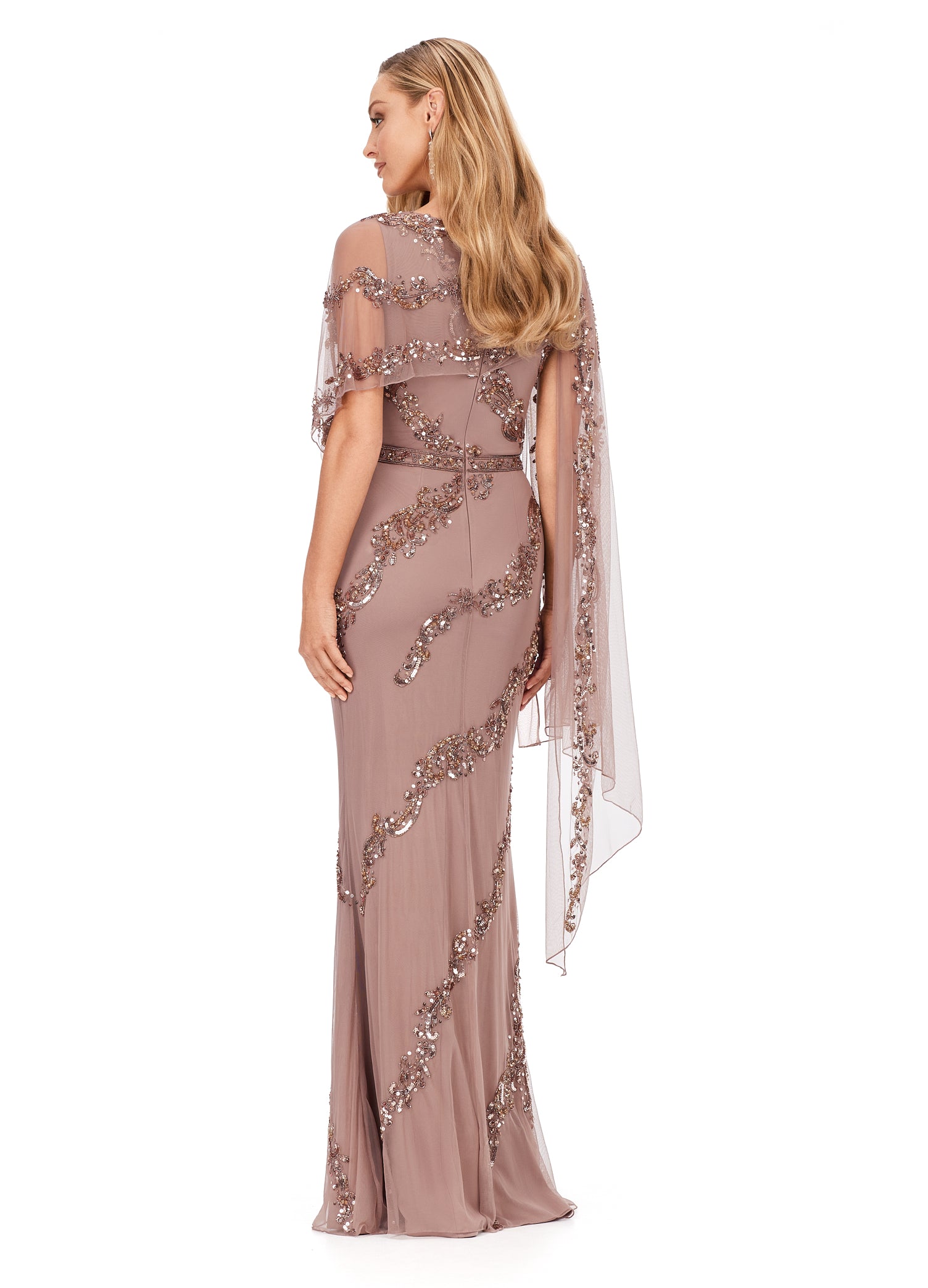 Ashley Lauren 11213 Asymmetric Detachable Overlay High Back Fully Hand Beaded Crew Neckline Evening Dress. This stunning evening gown is complete with an intricate bead motif. The bustier is adorned with an asymmetrical overlay which falls down the left arm.