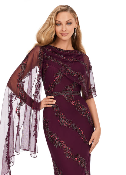 Ashley Lauren 11213 Asymmetric Detachable Overlay High Back Fully Hand Beaded Crew Neckline Evening Dress. This stunning evening gown is complete with an intricate bead motif. The bustier is adorned with an asymmetrical overlay which falls down the left arm.