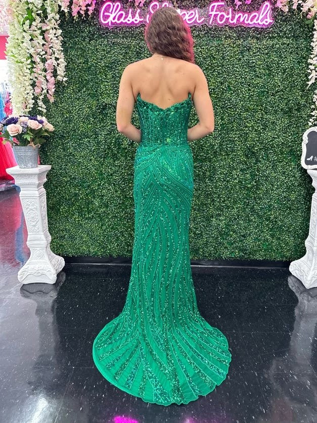 Ashley Lauren 11236 Long Fitted V Neck Slit Beaded Sequin Prom Dress Pageant Gown This strapless gown is sure to turn heads. The sweetheart neckline is complete with a modern floral sequin motif that continues down the bustier and skirt. The skirt is complete with a left leg slit.