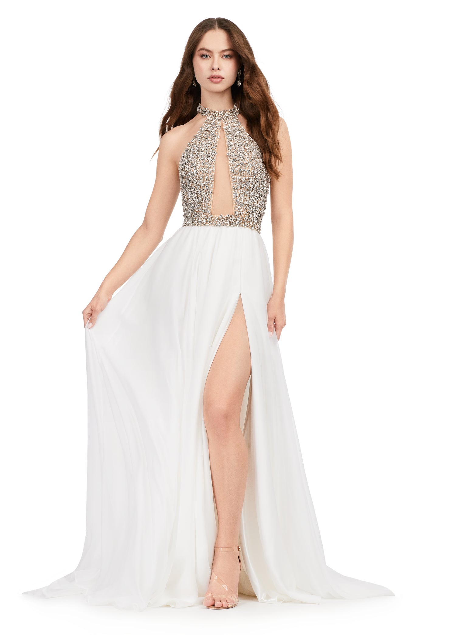Ashley Lauren 11248 Chiffon Crystal Gown Beaded Bustier Maxi Slit Cross Back Halter Neckline A-Line Formal Dress. This chiffon A-line gown features a beautifully beaded halter top that is sure to shine bright at any event. The look is complete with an illusion cut out and high left leg slit.