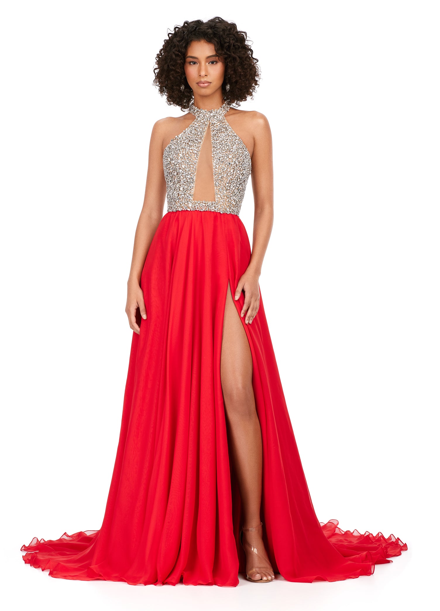 Ashley Lauren 11248 Chiffon Crystal Gown Beaded Bustier Maxi Slit Cross Back Halter Neckline A-Line Formal Dress. This chiffon A-line gown features a beautifully beaded halter top that is sure to shine bright at any event. The look is complete with an illusion cut out and high left leg slit.
