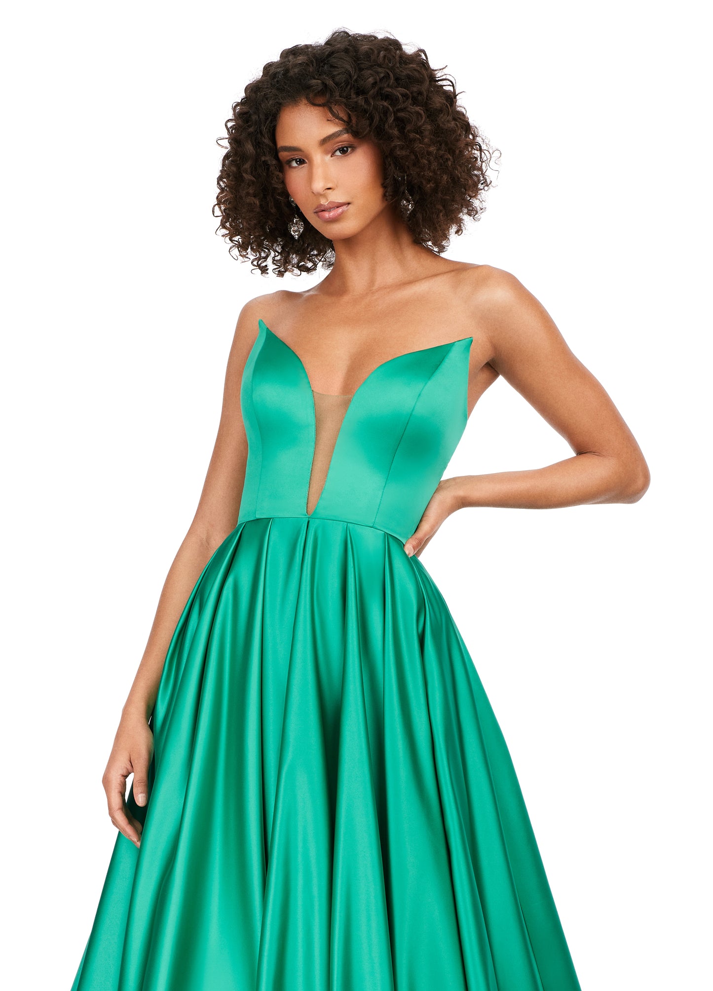 Ashley Lauren 11250 Strapless Plunging Neckline Heavy Satin A-Line Sweeping Train Ballgown Formal Dress. This satin ball gown features an elegant illusion v-neckline. The full A-Line skirt has pockets and a sweeping train.