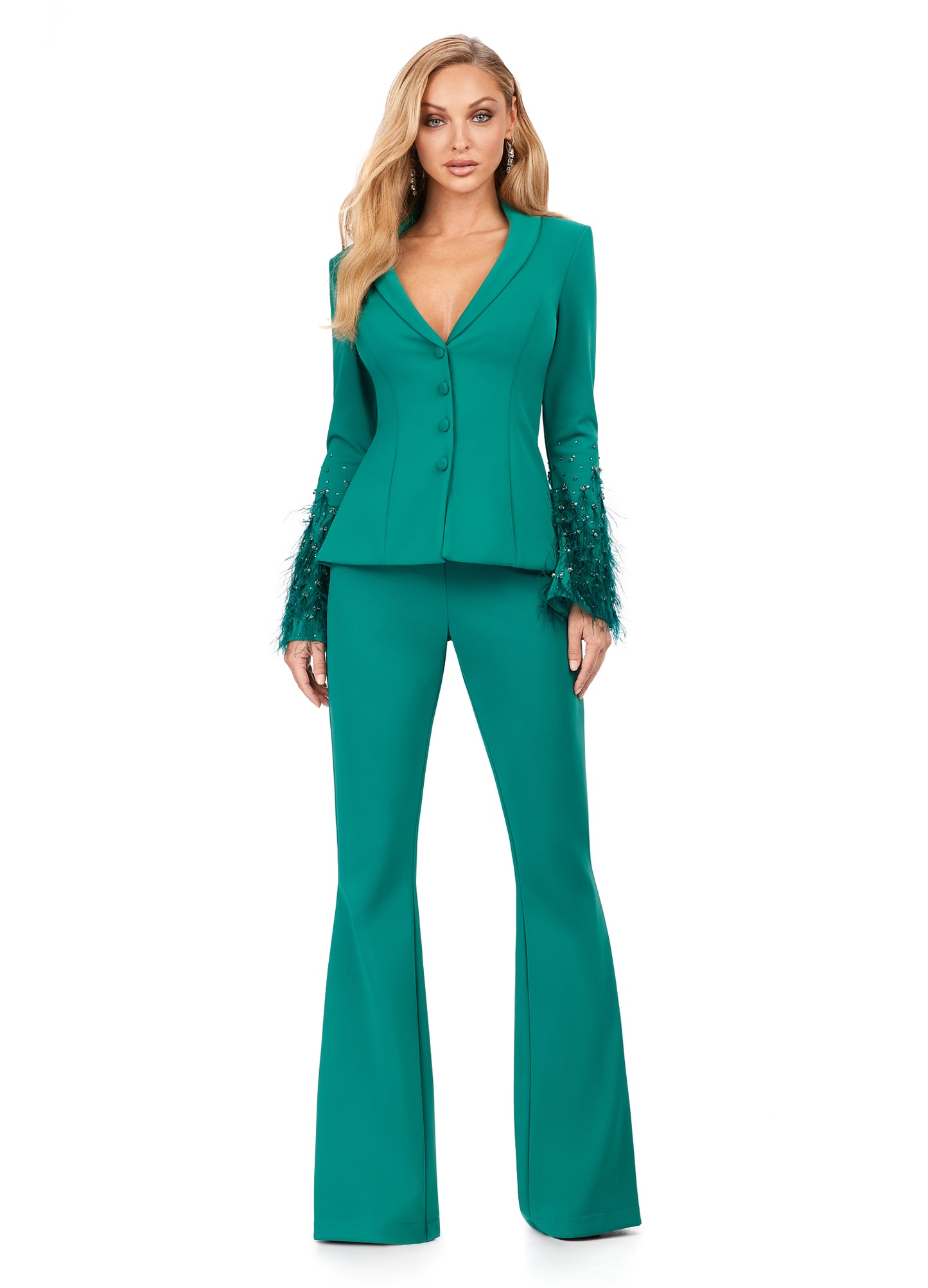 Ashley Lauren 11315 Long Sleeve With Feather And Crystal Accent Two Piece V-Neck Scuba Material Suit. We are obsessed with this suit! Made out of our signature scuba material, this two piece suit features stunning sleeve details with a mix of crystals and feathers. The pants have a flare bottom.
