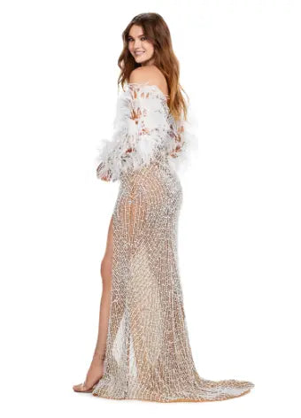 This Ashley Lauren 11359 Long Prom Dress is a fully beaded gown with feather sleeves, perfect for any formal occasion or pageant. The intricate beading and feather details add a touch of elegance and style, making you stand out in the crowd. Look and feel like a true queen in this stunning dress. We're living for this glam gown! This fitted, fully beaded dress features a sweetheart neckline with feather sleeves and a left leg slit.