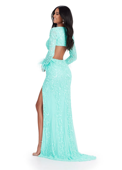 Ashley Lauren 11364 Talk about fabulous?! This beaded gown features a criss-cross cut out bodice and long sleeves. The sleeves are trimmed in feathers. The gown is complete with a left leg slit and sweep train.