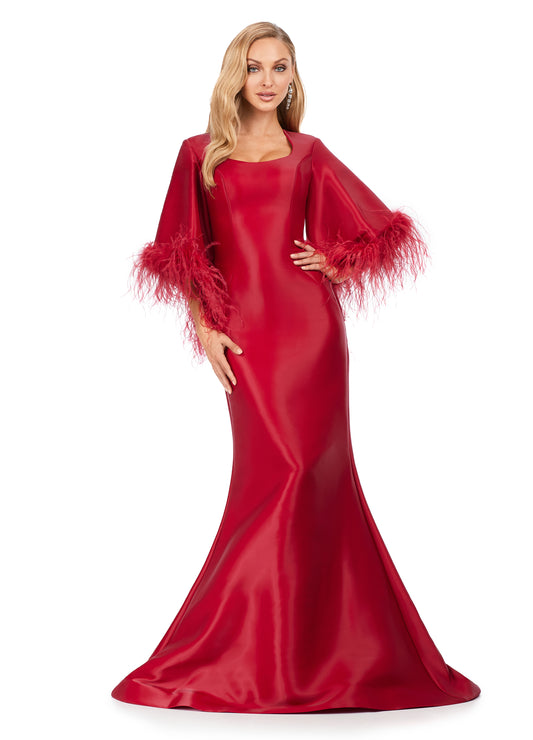 Ashley Lauren 11381 Fit And Flare Dress With Feather Sleeves Scoop Neckline Phantom Satin Formal Dress. Make an entrance in this phantom satin fit and flare gown with flare sleeves. The modern scoop neckline and sleeves trimmed in feathers are sure to stand out. The skirt is finished with horsehair.