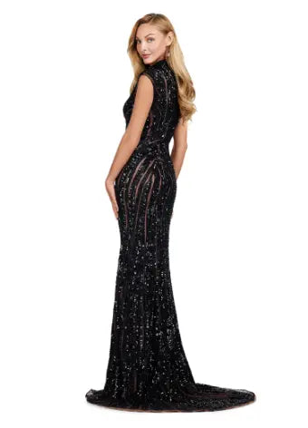 Make a statement in this Ashley Lauren 11395 long prom dress. With its fully beaded bodice and fitted silhouette, it is sure to turn heads. The high neck and center slit add a touch of elegance, making it the perfect choice for a formal event or pageant. This fully sequin dress has an intricate beaded motif that is sure to accentuate your curves. With its elegant high neckline and modest center slit, this dress will have you feeling like royalty!
