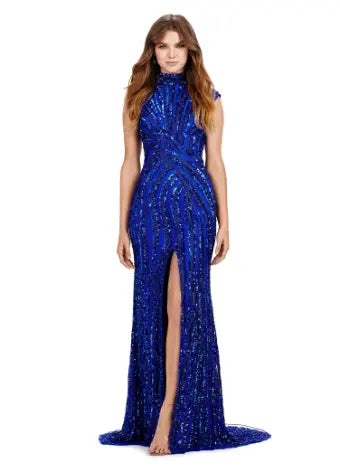 Make a statement in this Ashley Lauren 11395 long prom dress. With its fully beaded bodice and fitted silhouette, it is sure to turn heads. The high neck and center slit add a touch of elegance, making it the perfect choice for a formal event or pageant. This fully sequin dress has an intricate beaded motif that is sure to accentuate your curves. With its elegant high neckline and modest center slit, this dress will have you feeling like royalty!