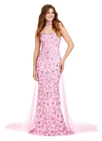Dazzle everyone in this Ashley Lauren 11404 Long Prom Dress. The stunning strapless gown features intricate beading and a flowy chiffon cape. Perfect for formal events, prom, or pageants. Be the center of attention with this fully beaded gown and choker. Fall in love with this fully sequin strapless gown. With the sequin choker and chiffon cape this gown is sure to make a statement.