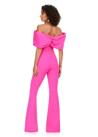Make a statement at your next formal event with the Ashley Lauren 11414 Off Shoulder Scuba Jumpsuit. Its stylish off-shoulder design and oversized bow add a touch of elegance, while the scuba material provides a comfortable and flattering fit. Perfect for prom or any special occasion. Turn heads in this jumpsuit! This look is complete with an oversized bow off shoulder neckline.