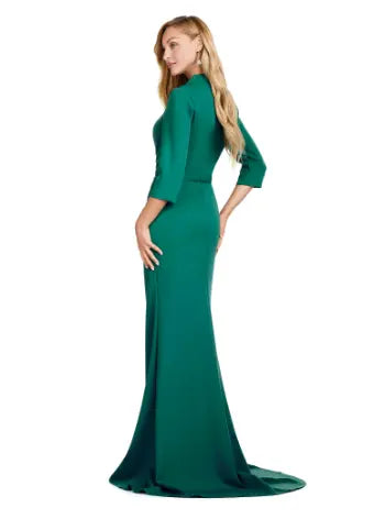 Introducing the Ashley Lauren 11418 Long Prom Dress, perfect for any formal occasion. This stunning mermaid style gown is made from high-quality scuba fabric, designed to hug your curves and create a sleek silhouette. The square neckline adds a touch of sophistication, making it a must-have for pageants and formal events. Dance the night away in this square neckline gown. The fitted gown is complete with three quarter length sleeves and a tonal belt. 