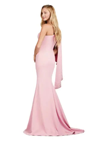 Elevate your formal ensemble with the Ashley Lauren 11421 Long Prom Dress. This fitted one shoulder gown features cascading ruffle sleeves, adding an elegant touch to your look. Perfect for pageants and prom, this dress is sure to make a statement. Expertly crafted for a flawless fit. This dress is all about classic elegance. The one shoulder design features a cascading ruffle sleeve with press on stone details.