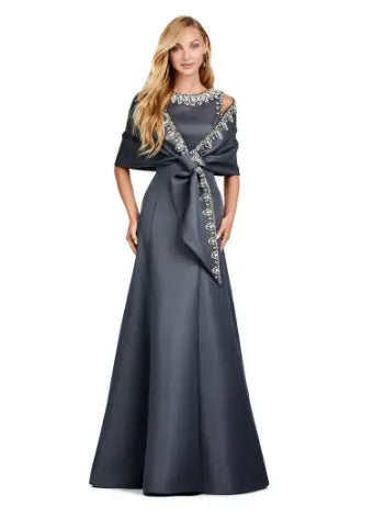 Step into sophistication with the Ashley Lauren 11426 Long Prom Dress. Made from luxurious satin, this A-line dress features a crew neckline and elegant silhouette perfect for formal events and pageants. Elevate your style with this timeless and versatile piece. Dazzle in this elegant and modern evening gown. With beautiful beaded details, this dress is sure to make an entrance. The dress is adorned with crystal details and a slight A-line skirt.