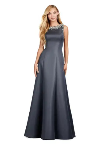 Step into sophistication with the Ashley Lauren 11426 Long Prom Dress. Made from luxurious satin, this A-line dress features a crew neckline and elegant silhouette perfect for formal events and pageants. Elevate your style with this timeless and versatile piece. Dazzle in this elegant and modern evening gown. With beautiful beaded details, this dress is sure to make an entrance. The dress is adorned with crystal details and a slight A-line skirt.