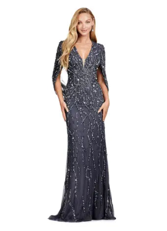 This long prom dress by Ashley Lauren 11430 features a stunning sequin V-neck and elegant cape sleeves, perfect for a formal pageant or evening event. The modern design and quality construction make it a must-have for any fashion-forward individual looking to make a statement. Look and feel confident in this unique, eye-catching gown. 