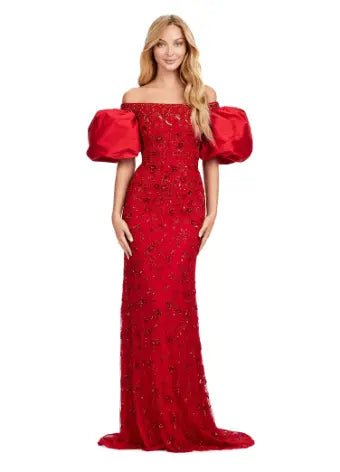 Make a statement with the Ashley Lauren 11432 long prom dress. Sparkling beads cover this off shoulder gown, featuring puff sleeves for a touch of drama. Perfect for formal events and pageants. Expertly crafted with quality materials for a luxurious feel. This fully beaded gown features taffeta puff sleeves that add the perfect amount of glam. The intricate bead pattern brings the entire look together.