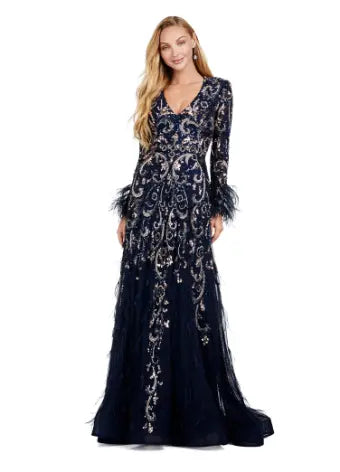 Elevate your style with the Ashley Lauren 11435 Long Prom Dress. With long sleeves, an A-Line gown, and feather details, this formal pageant dress exudes elegance and sophistication. The perfect combination of effortless grace and fashion-forward design, this dress is sure to turn heads at any formal occasion. This fully beaded A-line gown features a V-Neckline. The feather wrist detail elevates the look.