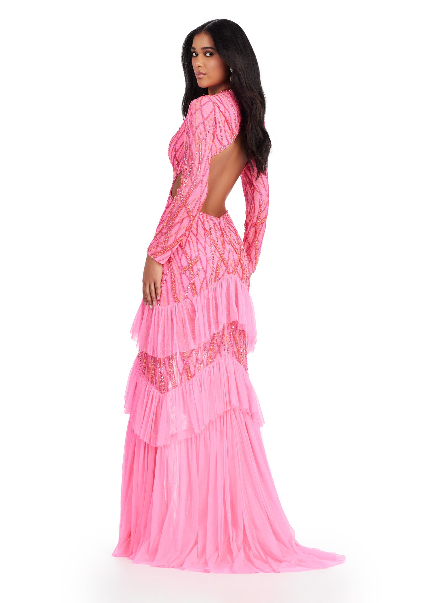 Step into elegance with the Ashley Lauren 11436 Long Prom Dress. This stunning gown features delicate beading, a flattering V-neckline, and a daring center slit with ruffled detailing. With its long sleeves, this dress is the perfect choice for a cool evening event. Make a statement in this formal gown. Fall in love with this gorgeous fully beaded long sleeve gown. Featuring an open back and center slit, this dress embodies effortless allure!