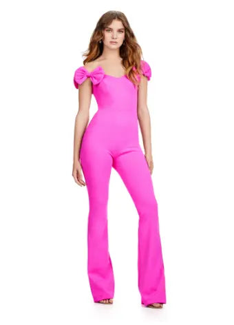 Introducing the Ashley Lauren 11439 Formal Scuba Jumpsuit, featuring a beautiful off shoulder design with elegant bow details. Made with high-quality scuba fabric, this jumpsuit offers a comfortable and sleek fit for any prom or formal occasion. Show off your fashion-forward style with this must-have piece. Strike a pose in this fun-fashion scuba jumpsuit! With the cutest off shoulder bow sleeves, this piece will give you the confidence you need at any event!