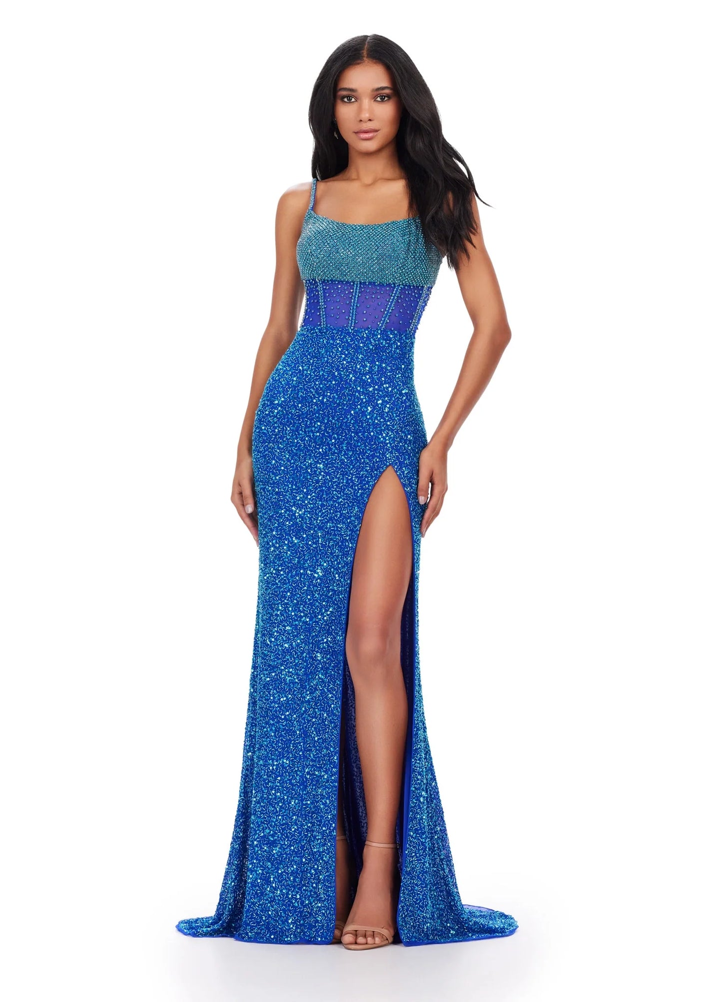 The Ashley Lauren 11448 is a stunning long gown for special occasions. It features a sequin-studded bodice with corset closure, side slit, and a backless design for a flattering silhouette. Perfect for proms, pageants, and formal events. All eyes will be on you in this fully beaded gown. The corset style bustier is embellished with crystals that are sure to dazzle. The left leg slit and lace up back complete the look. 
