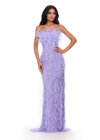 This Ashley Lauren long prom dress features a strapless, fully beaded bodice and a stunning feathered skirt, making it the perfect choice for any formal pageant. The intricate detailing and elegant design truly make this gown stand out and ensure you'll make a statement at any event. We're here for this look! This fully beaded strapless gown features an intricate beaded design and feathers throughout to help you stand out at your next event.
