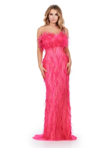 This Ashley Lauren long prom dress features a strapless, fully beaded bodice and a stunning feathered skirt, making it the perfect choice for any formal pageant. The intricate detailing and elegant design truly make this gown stand out and ensure you'll make a statement at any event. We're here for this look! This fully beaded strapless gown features an intricate beaded design and feathers throughout to help you stand out at your next event.