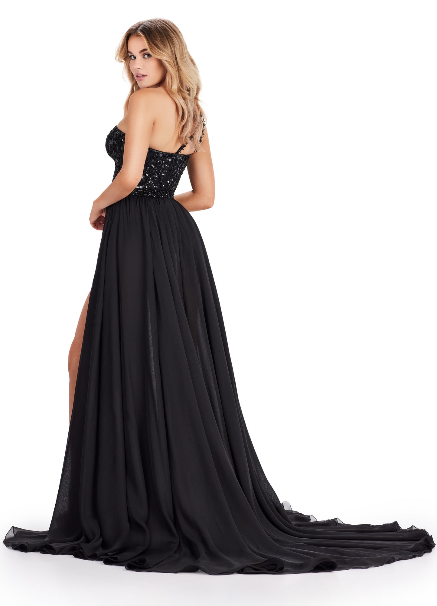 Expertly crafted for maximum impact, the Ashley Lauren 11460 Long Prom Dress is a show-stopping choice for any formal event. The one shoulder beaded bodysuit adds a touch of glamour, while the chiffon overskirt exudes elegance. Trust in Ashley Lauren's expertise for a flawless look. Dare to be different in this fabulous one shoulder beaded bodysuit with a detached chiffon overskirt. The skirt features a waist-high slit to give that perfect amount of drama!