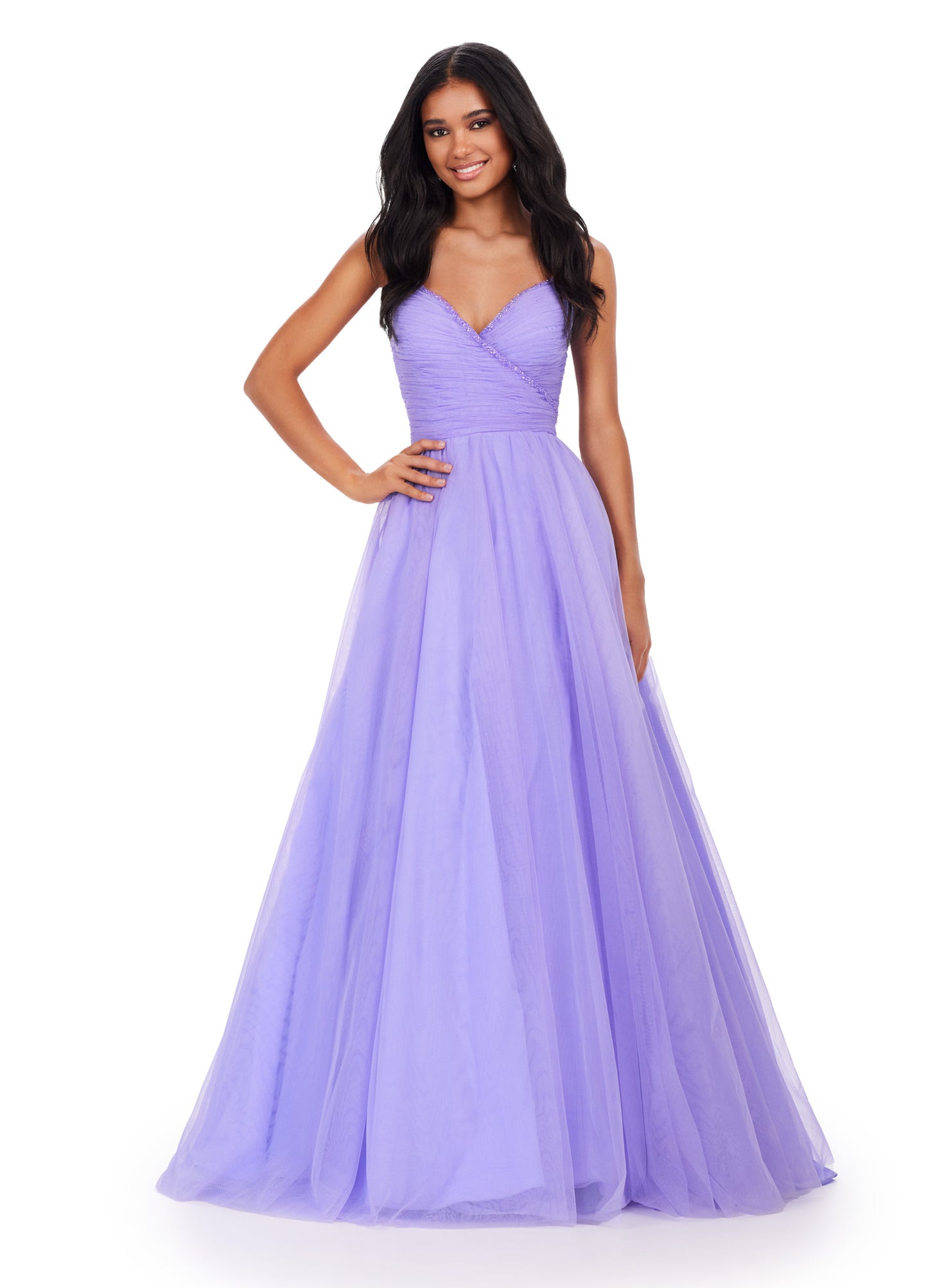 The Ashley Lauren 11461 Long Prom Dress is the perfect choice for your formal occasion. This elegant gown features delicate spaghetti straps and a tulle ball gown skirt for a timeless look. The intricate beaded detailing adds a touch of sparkle, making you stand out from the crowd. Experience the ultimate in luxury with this pageant-worthy dress. This simplistic ball gown features dainty beaded spaghetti straps with a ruched bodice.