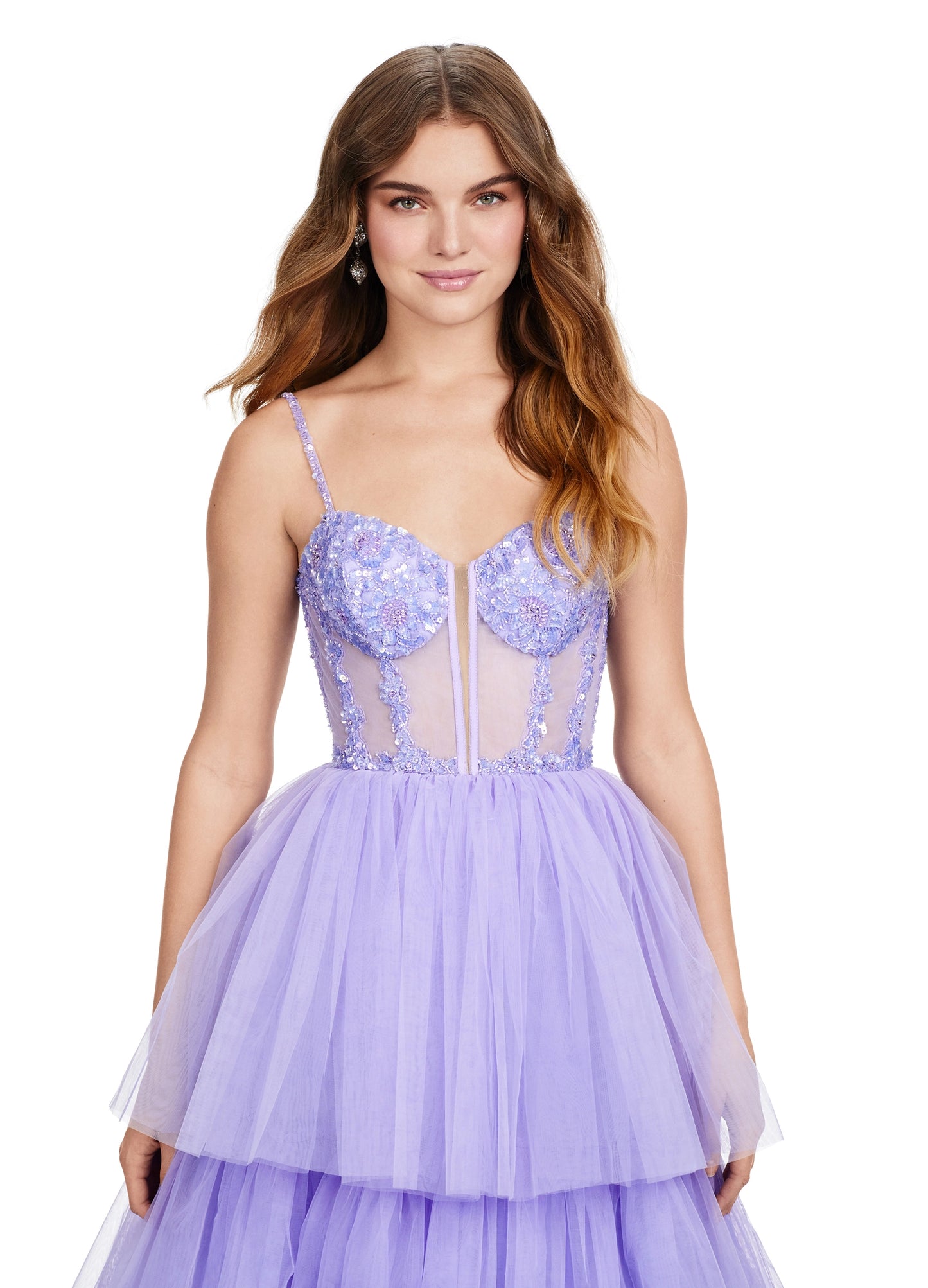 The Ashley Lauren 11462 Sheer Beaded Corset Layer Tulle Prom Dress Ballgown Pageant Tiered Gown is a statement-making piece. Crafted from sheer corset layers, delicate beadwork, and tiered tulle, it's perfect for any special occasion. Elegant and eye-catching, this dress features the perfect balance of comfort and sophistication.