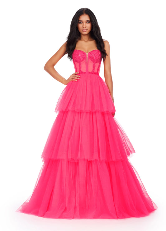 The Ashley Lauren 11462 Sheer Beaded Corset Layer Tulle Prom Dress Ballgown Pageant Tiered Gown is a statement-making piece. Crafted from sheer corset layers, delicate beadwork, and tiered tulle, it's perfect for any special occasion. Elegant and eye-catching, this dress features the perfect balance of comfort and sophistication.