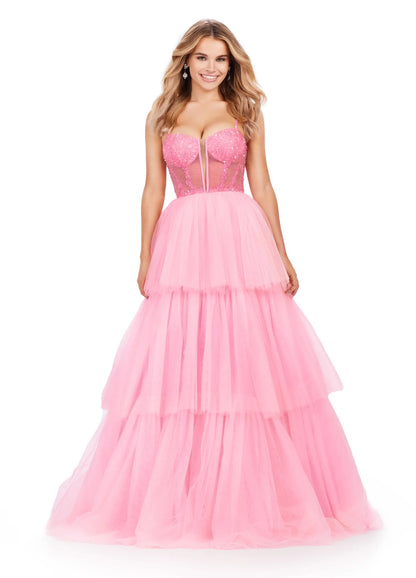The Ashley Lauren 11462 Sheer Beaded Corset Layer Tulle Prom Dress Ballgown Pageant Tiered Gown is a statement-making piece. Crafted from sheer corset layers, delicate beadwork, and tiered tulle, it's perfect for any special occasion. Elegant and eye-catching, this dress features the perfect balance of comfort and sophistication.