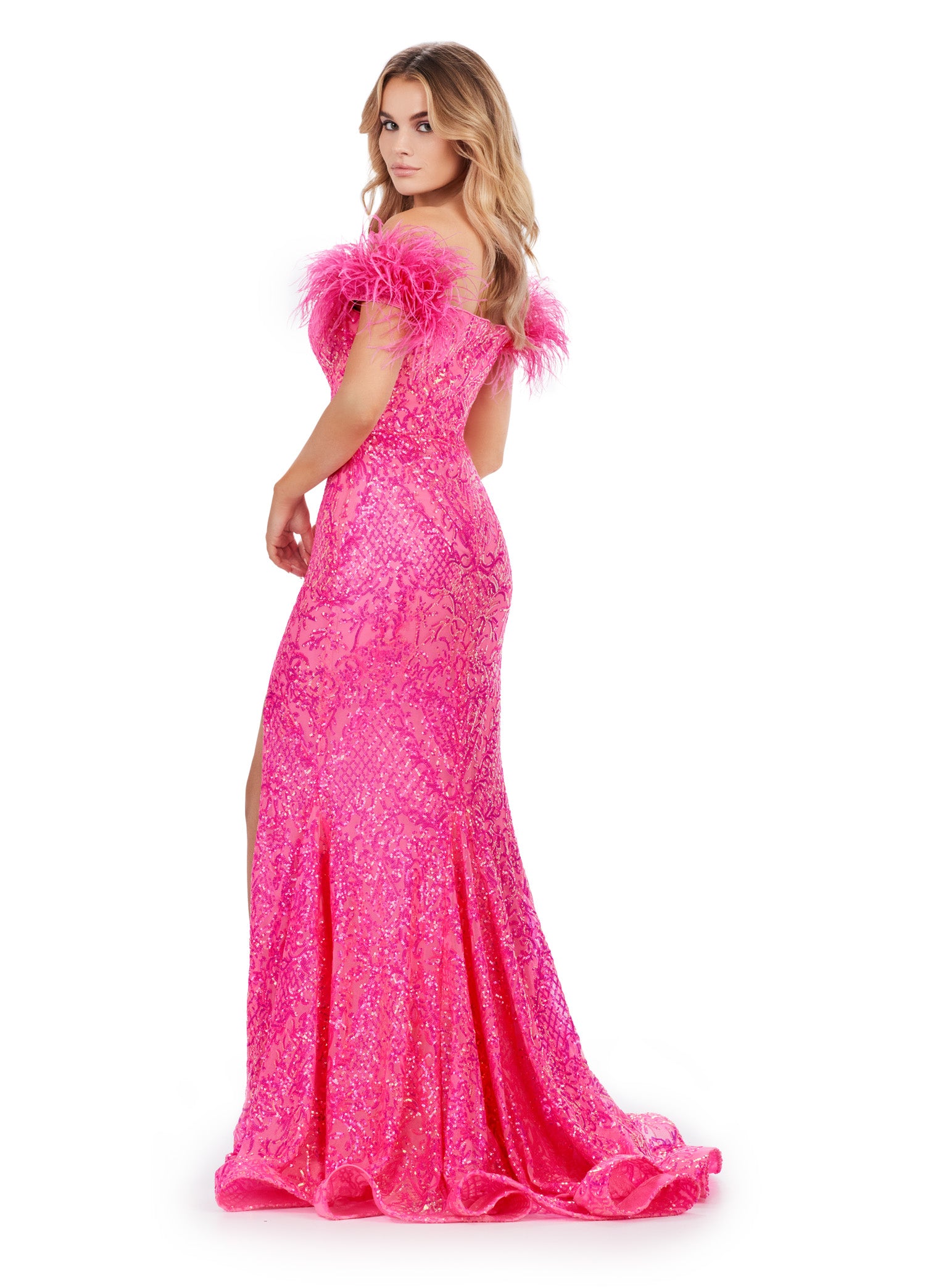 Elevate your prom look with the stunning Ashley Lauren 11463 Long Sequin Mermaid Prom Dress. The off the shoulder design and feather embellishments add a touch of glamour, while the slit detail adds a touch of flirtiness. This dress is perfect for making a statement on your special night. Stand out in this off the shoulder stretch sequin gown. We are living for this sweetheart neckline and feather details.