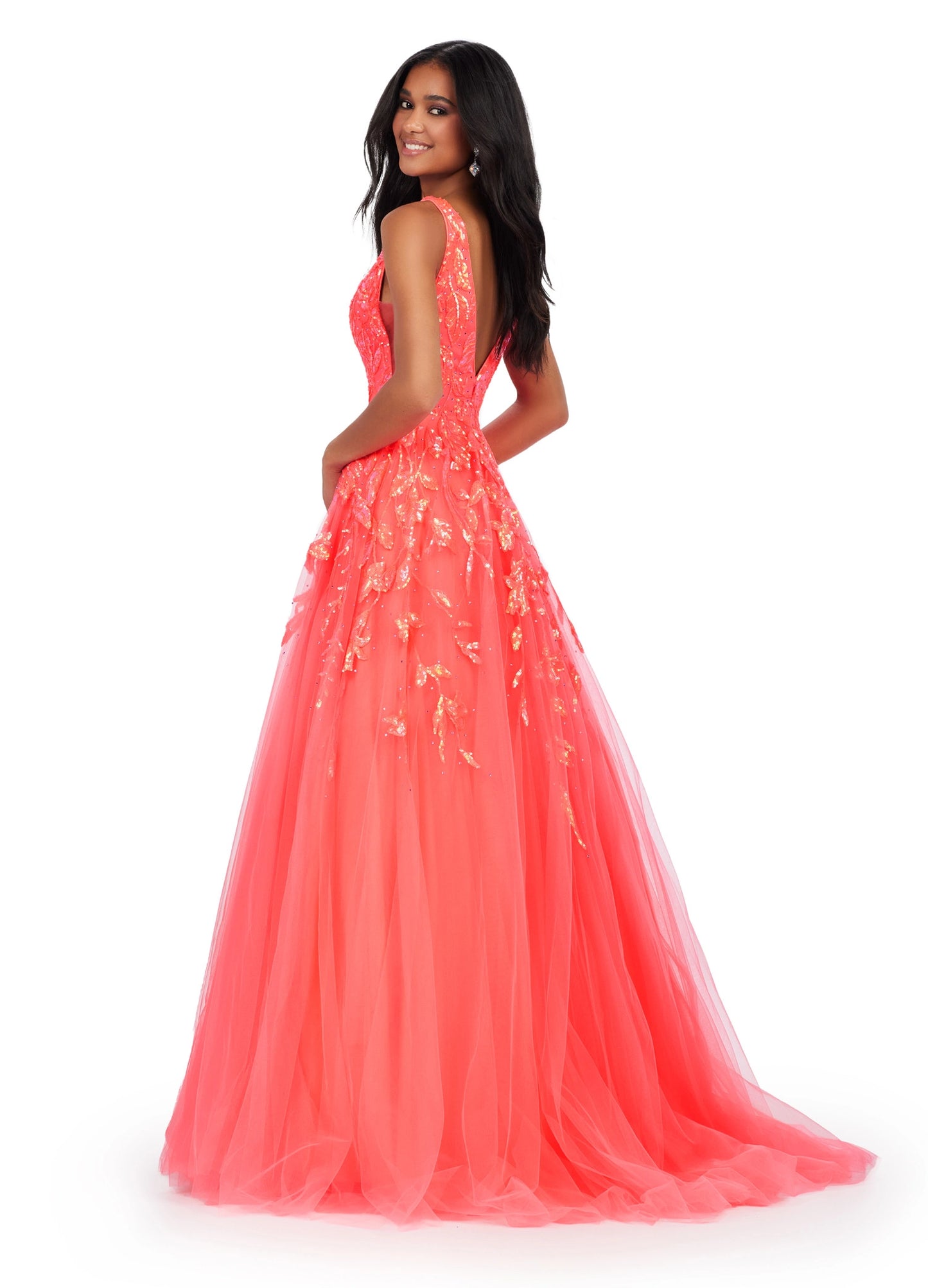 This Ashley Lauren 11470 Prom Dress will make a statement at any occasion. Made with sequin fabric and a pleated tulle skirt, the A-line silhouette will flatter any body shape, while the V-neckline adds a touch of sophistication. This glamorous gown is the perfect choice for making a lasting impression. 