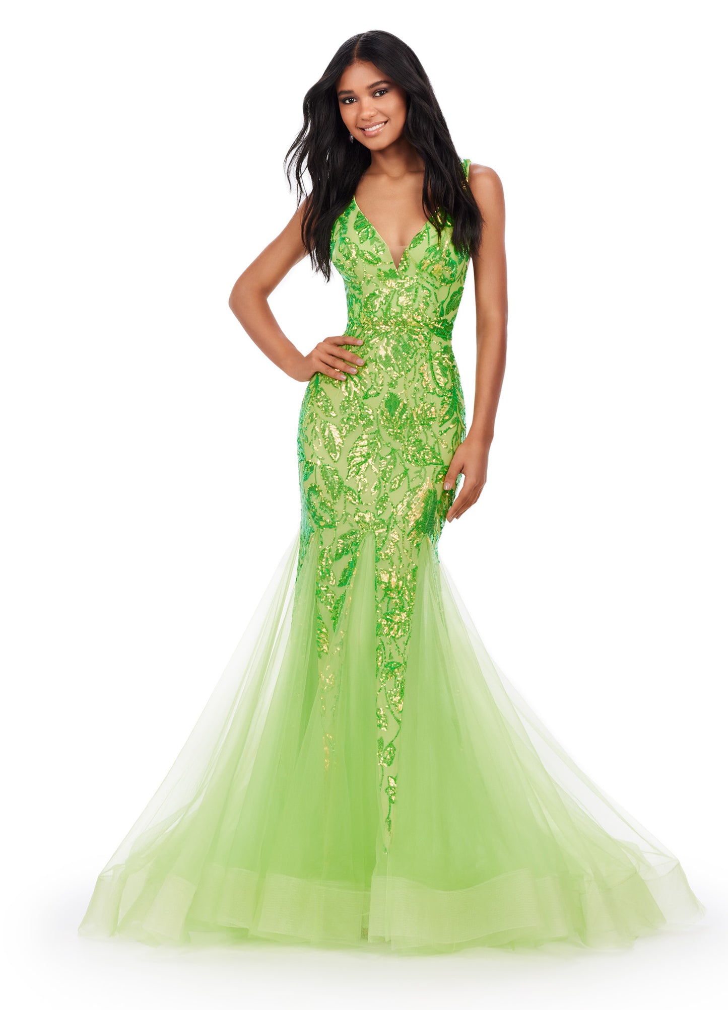 Get ready to command attention in the Ashley Lauren 11472 Long Prom Dress. With a stunning V-neck, sequin embellishments, and a mermaid skirt made with stretchy fabric, this gown is designed to enhance your figure and make you shine. Perfect for formal events, pageants, and more. Can you say iconic? This stretch sequin gown features a v-neckline and a pleated tulle skirt to help you slay your next event.
