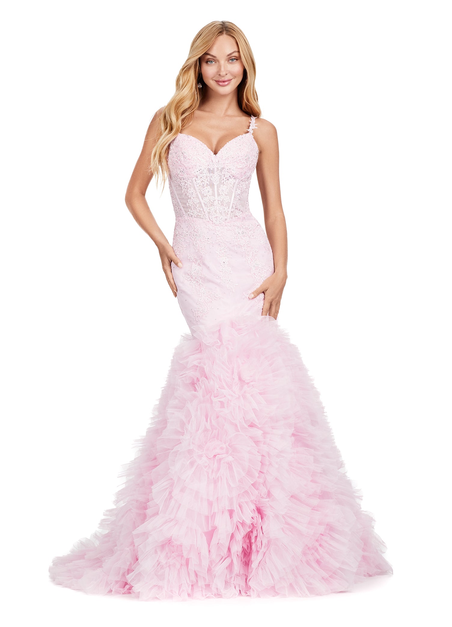Expertly designed by Ashley Lauren, this long prom dress features a stunning mermaid silhouette with spaghetti straps and a corset bustier. The ruffled tulle skirt adds a touch of romance to this formal pageant gown. Be the center of attention at your special event. This mermaid gown is what dreams are made of! With its lace details, exposed corset bustier and full ruffled tulle skirt, this dress is sure to impress!