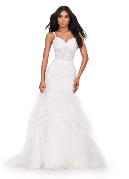 Expertly designed by Ashley Lauren, this long prom dress features a stunning mermaid silhouette with spaghetti straps and a corset bustier. The ruffled tulle skirt adds a touch of romance to this formal pageant gown. Be the center of attention at your special event. This mermaid gown is what dreams are made of! With its lace details, exposed corset bustier and full ruffled tulle skirt, this dress is sure to impress!