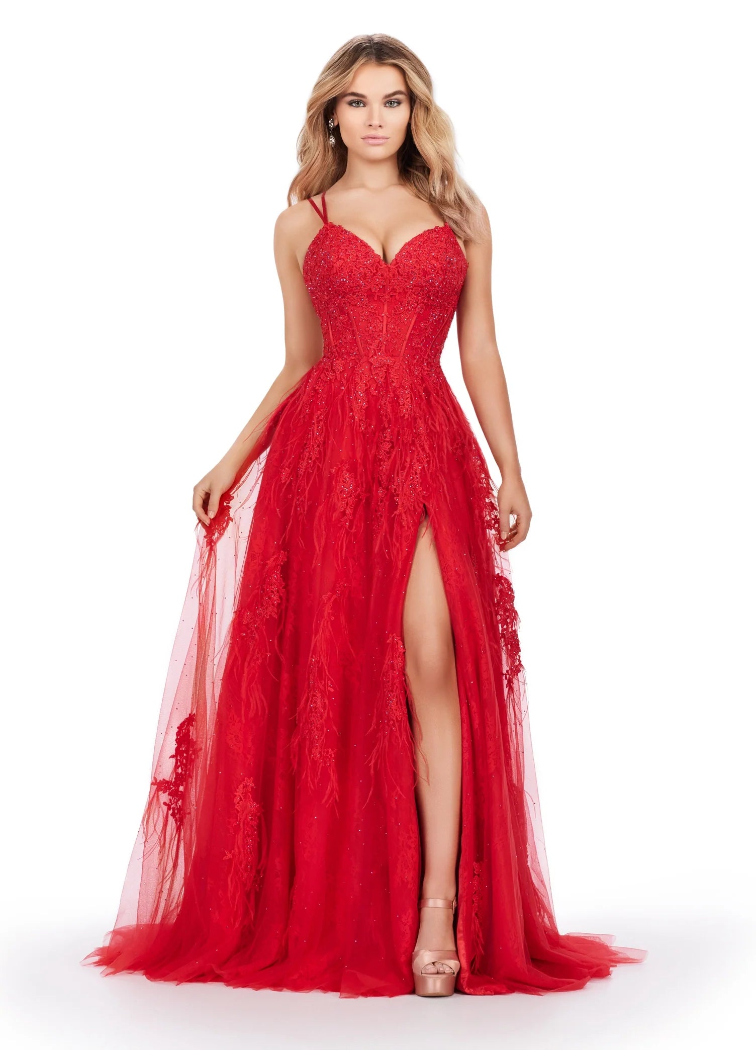 This Ashley Lauren 11480 dress is a stunningly unique piece for your next special event. Featuring intricate lace and feather detailing, a slim a-line fit with a thigh-high slit, a corset bodice, and an elegant low-back, this dress will be sure to draw attention. Perfect for prom, pageants, or any formal occasion. 