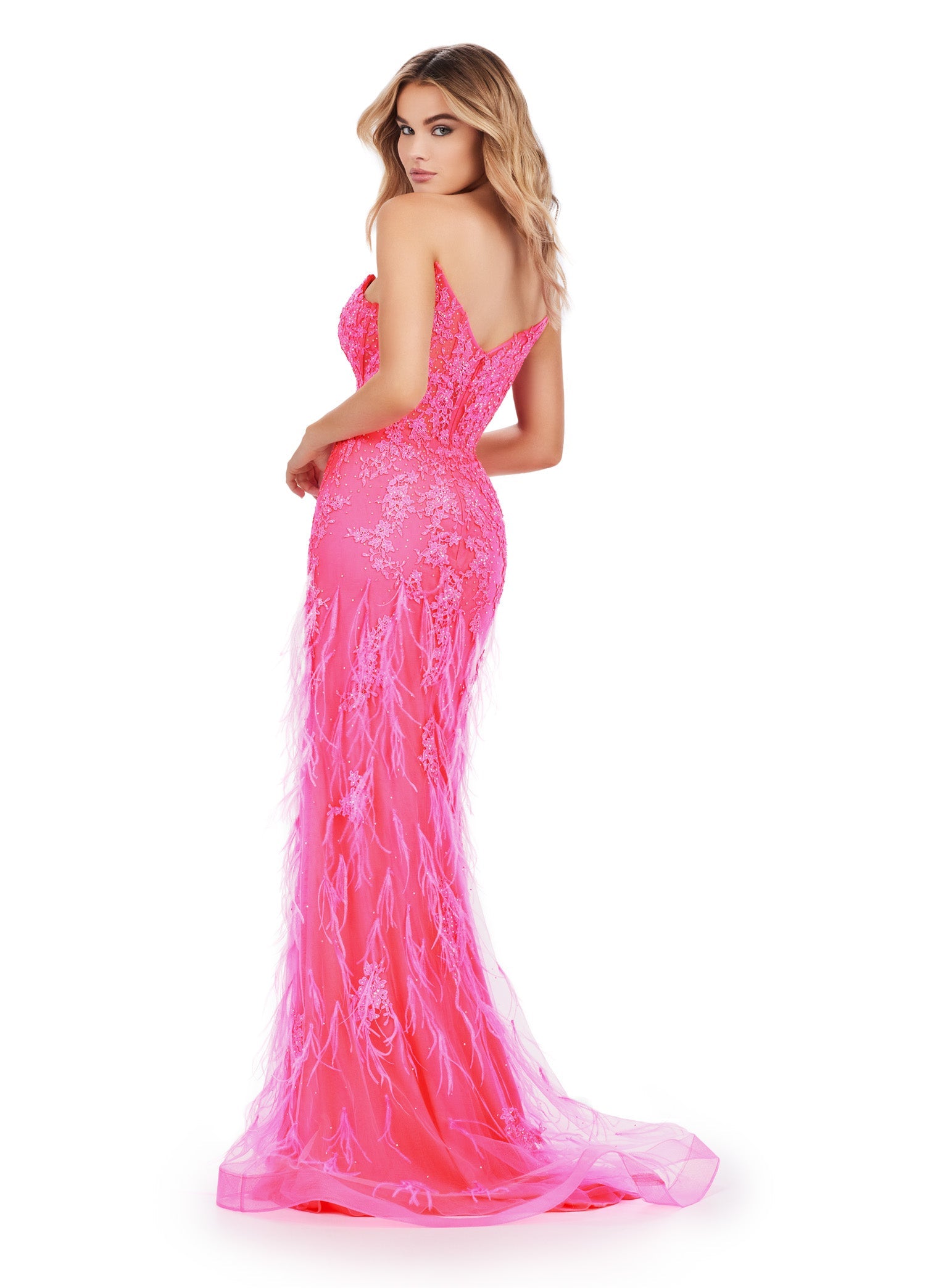 Elevate your elegance with the Ashley Lauren 11483 Long Prom Dress. This striking gown features a corset bodice, strapless design, and exquisite embroidered details. The v-neckline adds a touch of allure while the feather details bring a playful element. Perfect for formal events or pageants. Slay the night away in this lace embroidered gown. This dress features a strapless neckline and feathers throughout to help you feel fabulous.