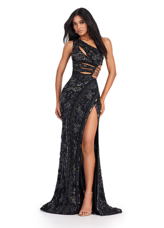 Expertly crafted for a stunning silhouette, the Ashley Lauren 11489 Long Prom Dress features a fitted one shoulder design with intricate sequin detailing. With stylish cut outs and a subtle slit, this formal pageant gown exudes elegance and sophistication. Perfect for making a statement at any special occasion. Wow the crowd in this fabulous fully beaded one shoulder gown. This dress features an intricate beaded design and asymmetric cut outs through out the bustier.