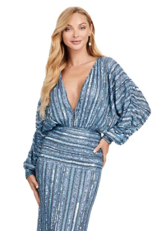 Be the star of any event with the Ashley Lauren 11490 Long Prom Dress. Its stunning V-neck, sequin detailing, and dolman sleeves add the perfect touch of glamour. This elegant evening gown is also perfect for formal events, pageants, and more. Make a statement with this timeless and sophisticated piece. Fun and fabulous! This elegant, fully beaded gown features a v-neckline and dolman sleeves to give the perfect amount of glam at your next event.