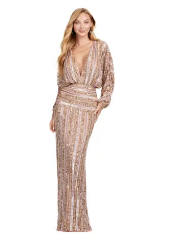Be the star of any event with the Ashley Lauren 11490 Long Prom Dress. Its stunning V-neck, sequin detailing, and dolman sleeves add the perfect touch of glamour. This elegant evening gown is also perfect for formal events, pageants, and more. Make a statement with this timeless and sophisticated piece. Fun and fabulous! This elegant, fully beaded gown features a v-neckline and dolman sleeves to give the perfect amount of glam at your next event.
