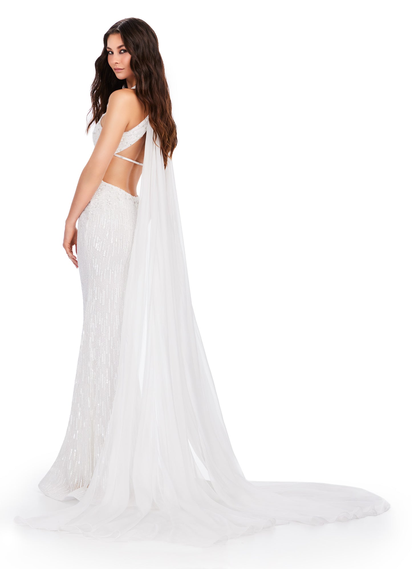 This Ashley Lauren 11499 long prom dress features beautiful beadwork and cut outs, as well as a stunning cape and halter design. Perfect for formal events and pageants, this gown will make you stand out with its elegant and glamorous style. Ready to hit the runway? This fully beaded halter neck gown features cut outs and chiffon capes to ensure you'll make an entrance.
