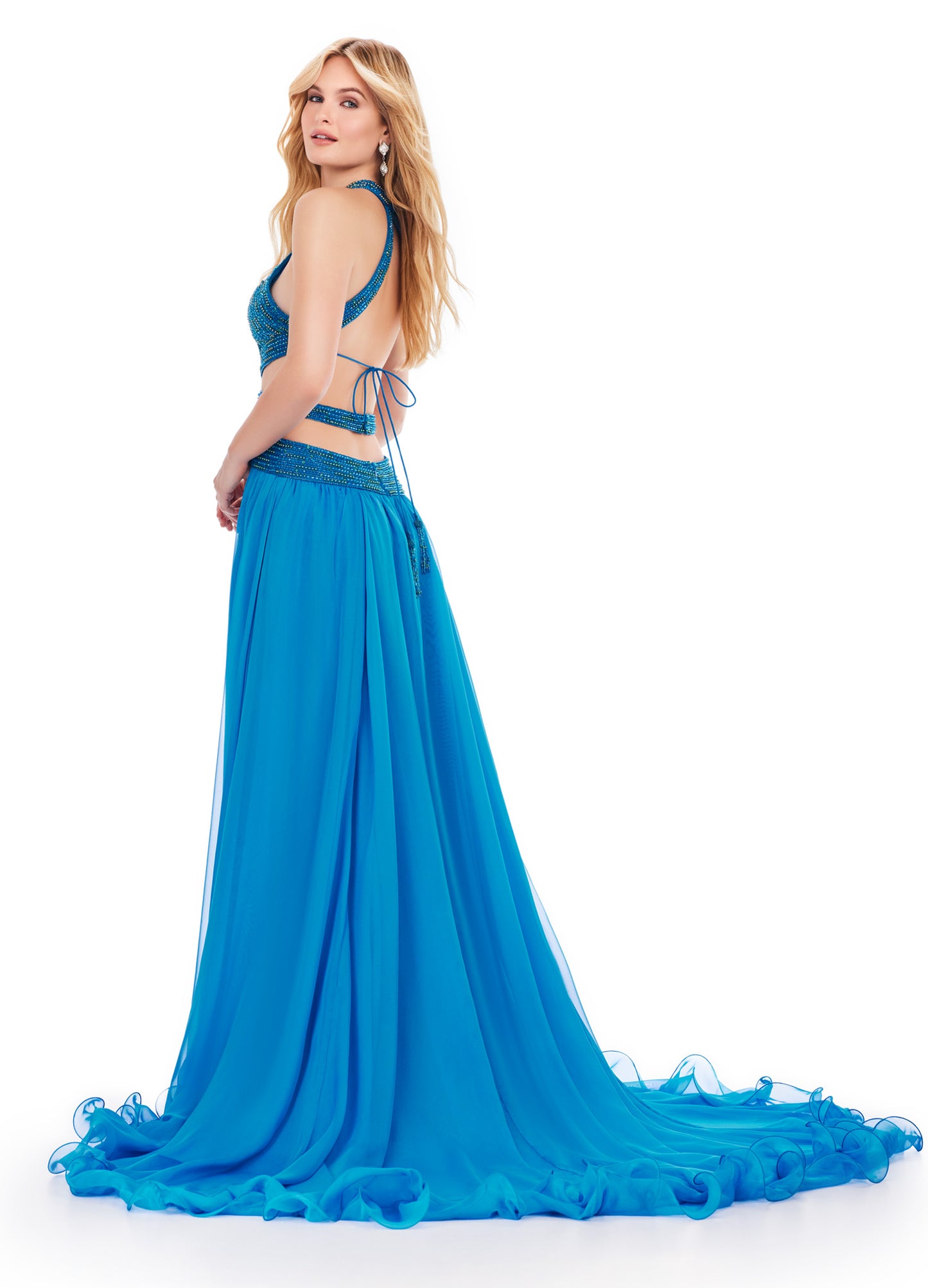 Elevate your formal attire with the Ashley Lauren 11504 Long Prom Dress. The cut out gown boasts a beaded bustier and chiffon skirt, creating a stunning silhouette that will turn heads. Perfect for prom, pageants, or any special occasion. Make a statement in this elegant and fashionable dress. Feel like royalty in this fabulous chiffon gown. The fully beaded bustier features intricate cut outs and an open back that'll be sure to set you apart from the crowd.
