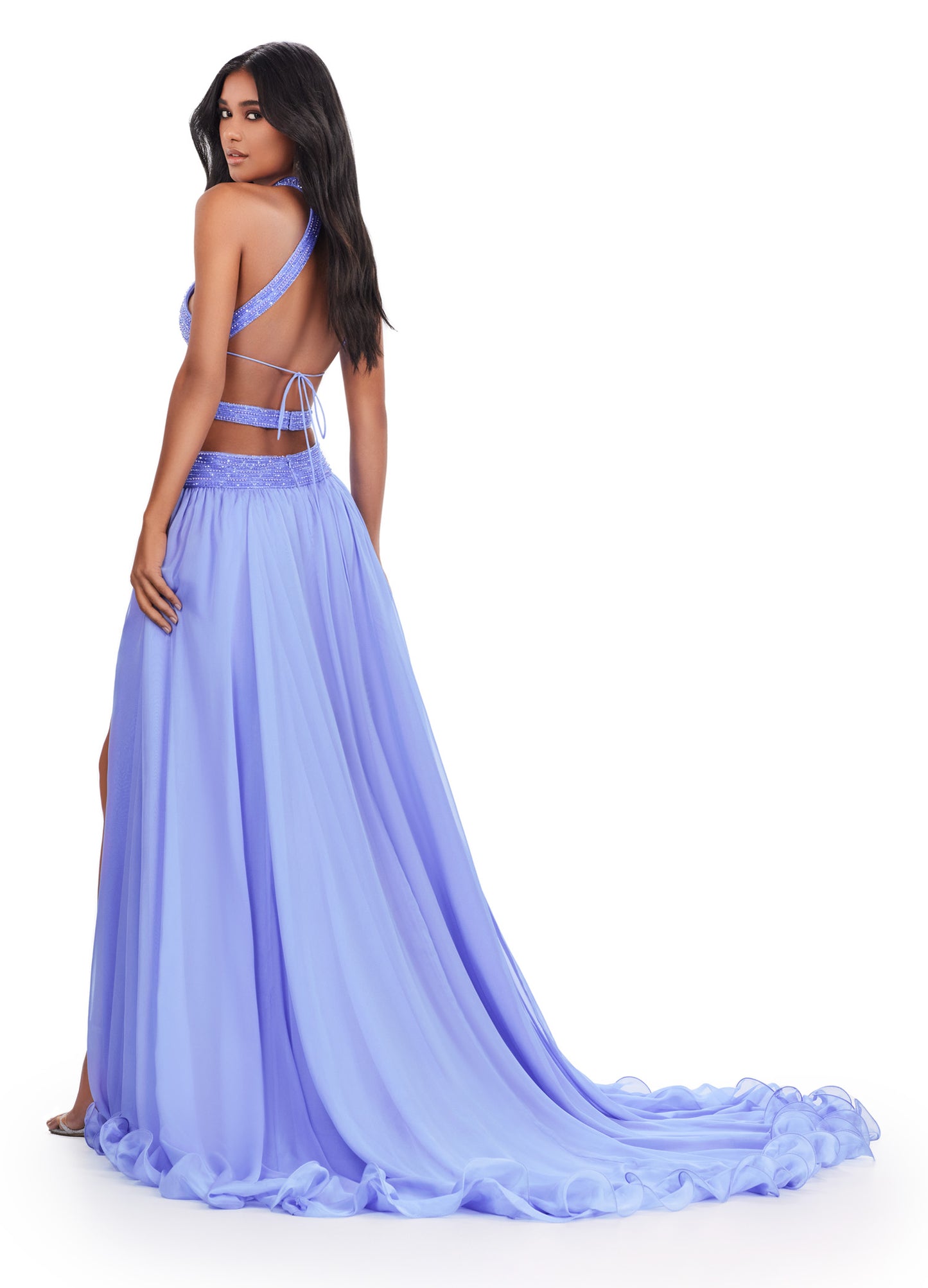 Elevate your formal attire with the Ashley Lauren 11504 Long Prom Dress. The cut out gown boasts a beaded bustier and chiffon skirt, creating a stunning silhouette that will turn heads. Perfect for prom, pageants, or any special occasion. Make a statement in this elegant and fashionable dress. Feel like royalty in this fabulous chiffon gown. The fully beaded bustier features intricate cut outs and an open back that'll be sure to set you apart from the crowd.