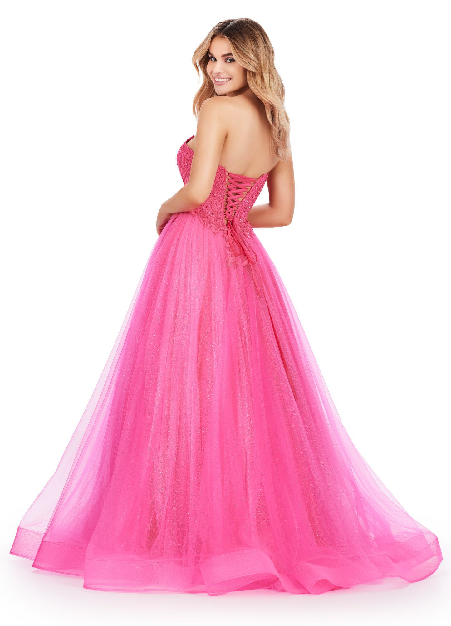 The Ashley Lauren 11518 is a stunning long prom dress that features a corset design and glitter tulle ball gown. The sweetheart neckline and formal pageant gown style make this dress perfect for any special occasion. Feel elegant and glamorous in this expertly crafted dress. The most romantic dress! This A-Line glitter tulle ball gown features a lace applique corset that laces up in the back.