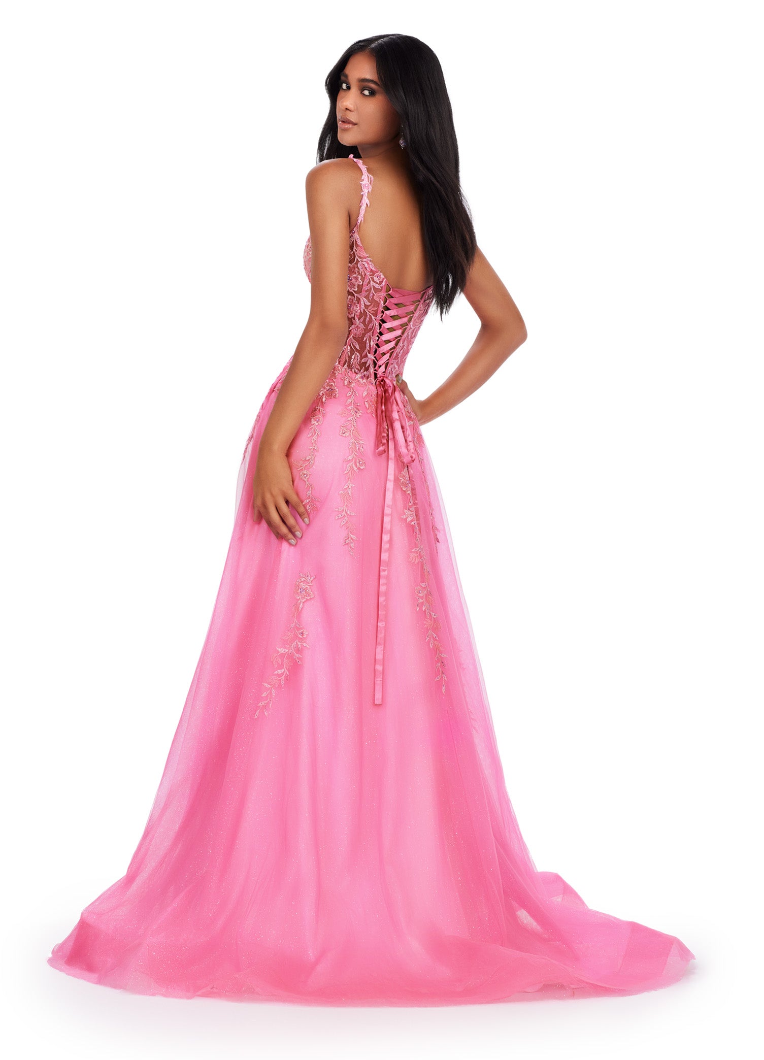 Step into the spotlight in the Ashley Lauren 11526 Long Prom Dress. Featuring spaghetti straps, a V-neckline, and a glitter tulle skirt, this gown is perfect for any formal event or pageant. With its elegant design and flattering silhouette, you'll feel like a star all night long. Living in a fairytale! This spaghetti strap gown features a v neckline with a lace applique bodice. The lace up back and glitter tulle skirt complete the look.