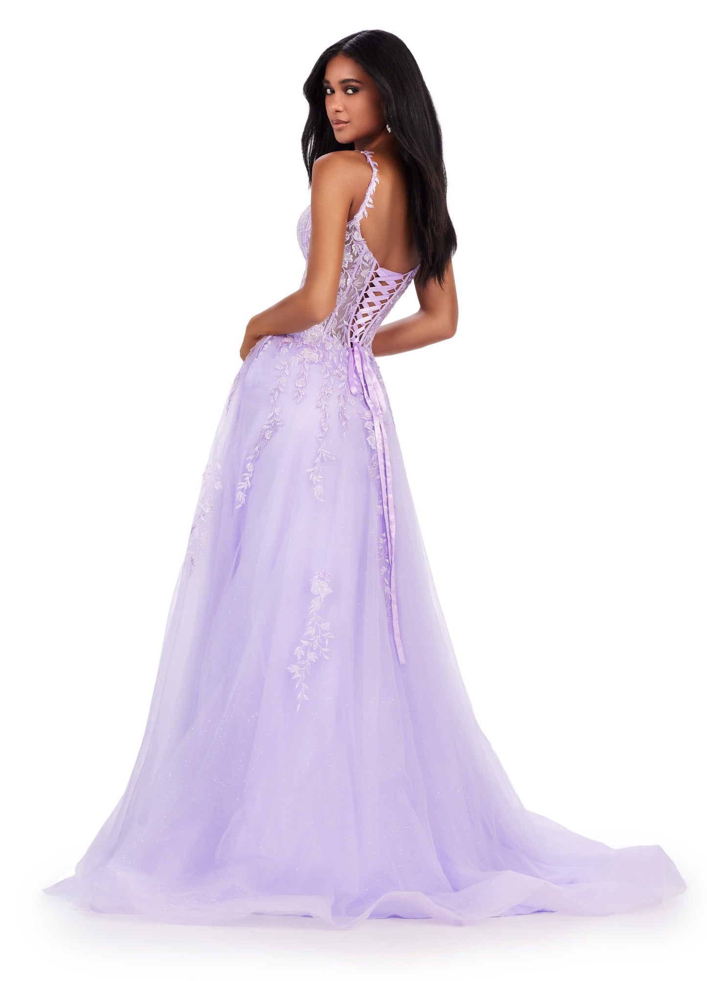Step into the spotlight in the Ashley Lauren 11526 Long Prom Dress. Featuring spaghetti straps, a V-neckline, and a glitter tulle skirt, this gown is perfect for any formal event or pageant. With its elegant design and flattering silhouette, you'll feel like a star all night long. Living in a fairytale! This spaghetti strap gown features a v neckline with a lace applique bodice. The lace up back and glitter tulle skirt complete the look.